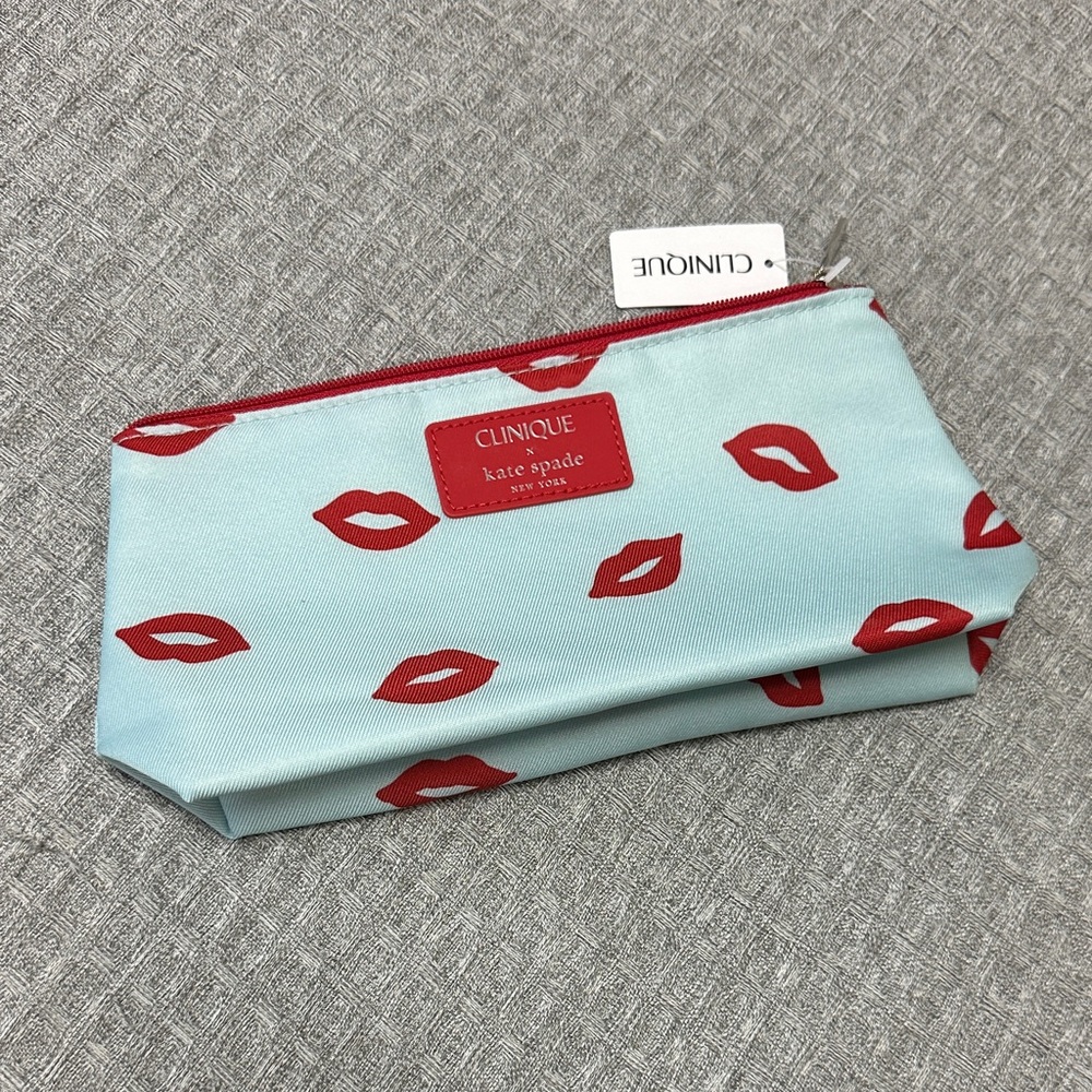 kate spade Light Blue Cosmetic Pouch with Red Lip Print